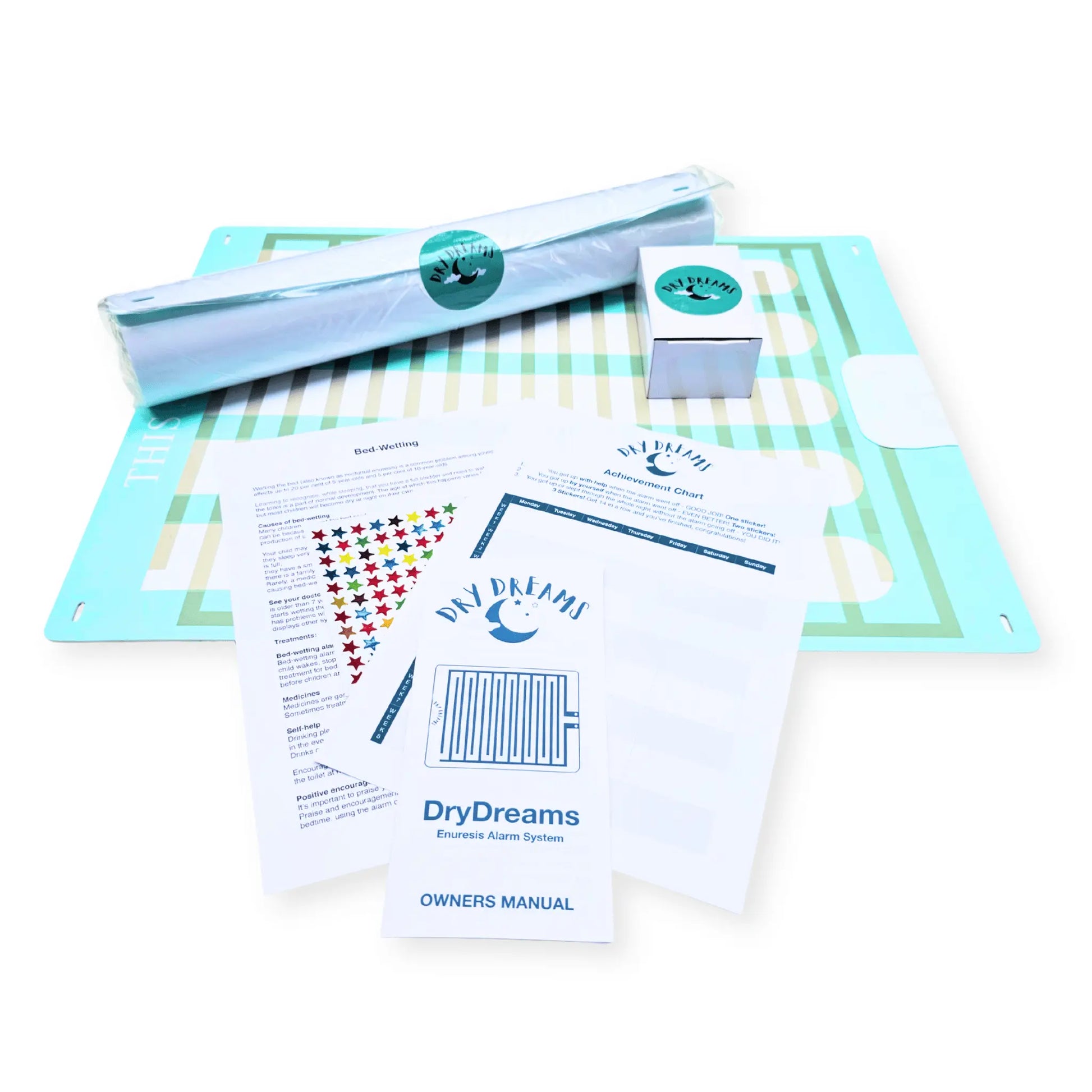  Full Drydreams bedwetting alarm kit and accessories, unboxed and laid out.